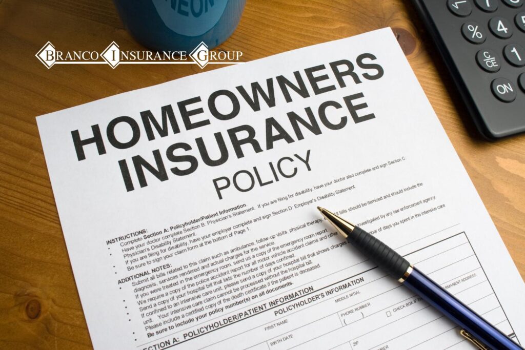 A paper with homeowners insurance policy written on it.